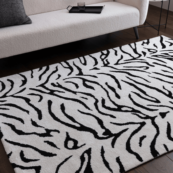 Grounding Luxury: The Interior Designer’s Guide to Rug Styling