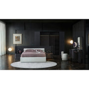 Sorell Dressing Table and tall mirror at the right of a coordinated bedroom