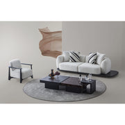 Sorell Side Table — beside the sofa and tables in a neutral room setting