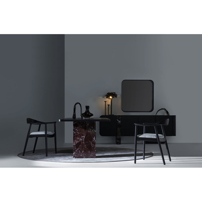 Sorell Sideboard in a dark dining room setting with table and chairs