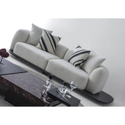 Sorell Sofa — angled view of the rounded cushions and dark platform
